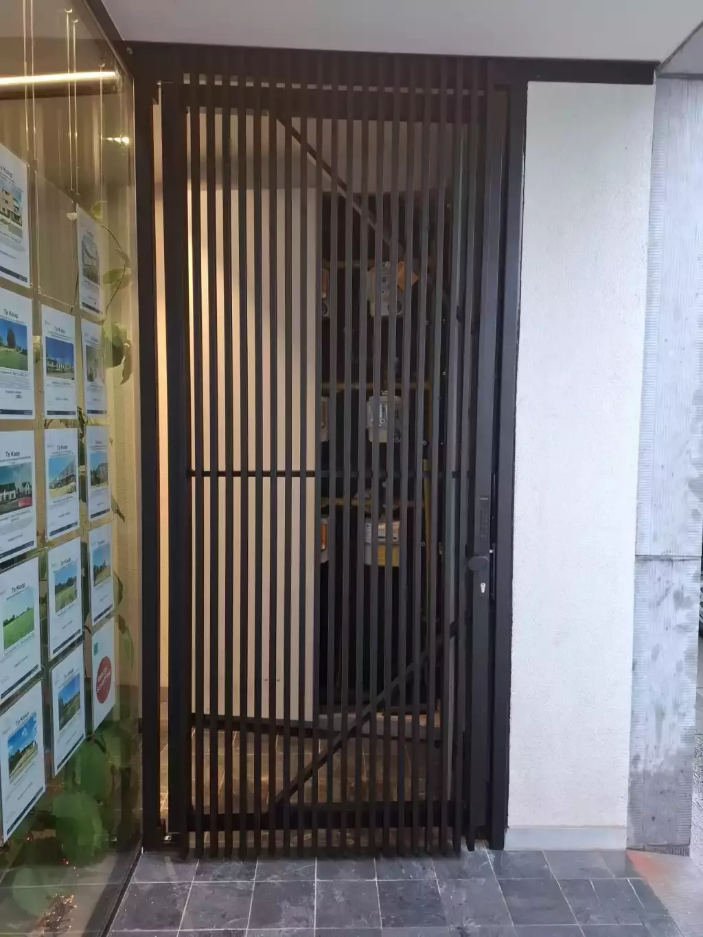 Buitenpoort met codeklavier